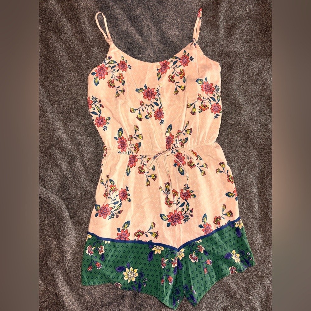 woman’s Romper with Pink and Green Floral Design